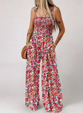 Blomstret, ermeløs jumpsuit for damer – smocket brystparti og vide ben – sommerlig chic 👒�
