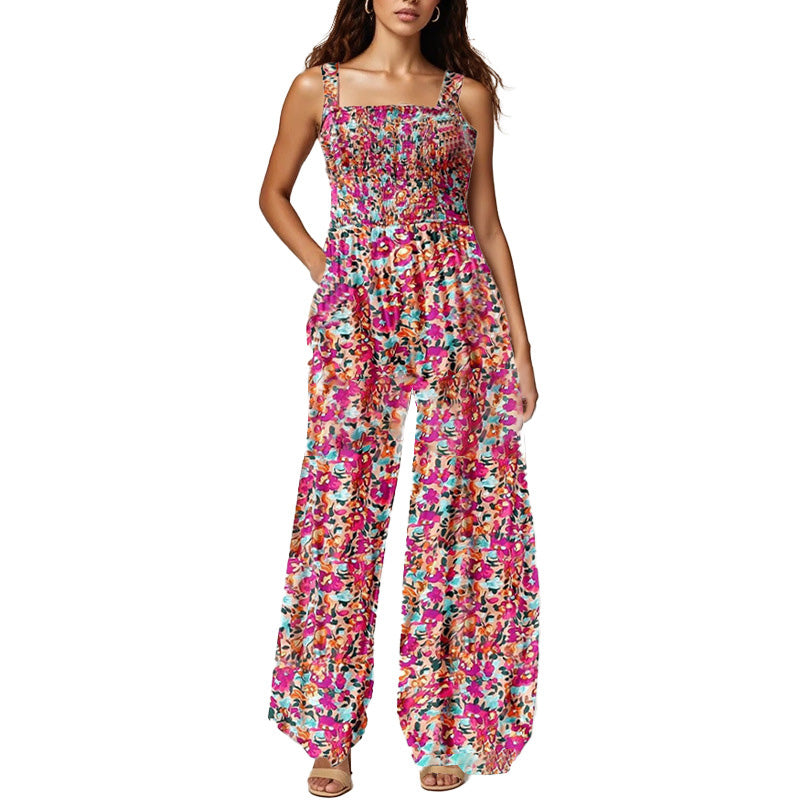 Blomstret, ermeløs jumpsuit for damer – smocket brystparti og vide ben – sommerlig chic 👒�