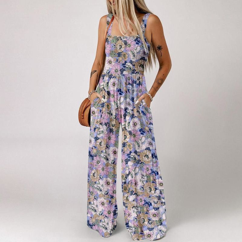 Blomstret, ermeløs jumpsuit for damer – smocket brystparti og vide ben – sommerlig chic 👒�