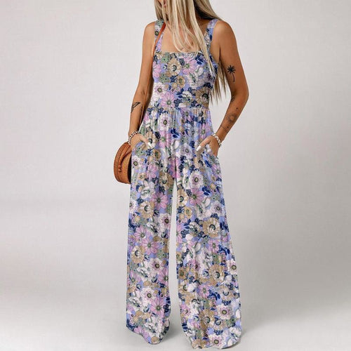 Blomstret, ermeløs jumpsuit for damer – smocket brystparti og vide ben – sommerlig chic 👒�